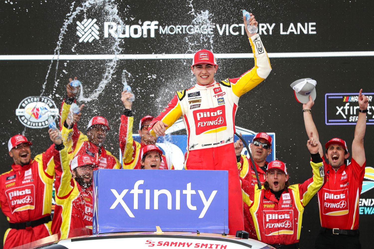 Sammy Smith celebrates in victory lane this past March after winning the NASCAR Xfinity Series United Rentals 200 at Phoenix Raceway. (Photo by Meg Oliphant/Getty Images)